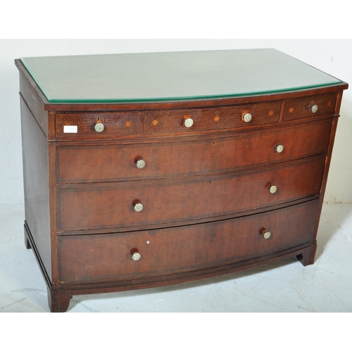 1504 - Early 20th century mahogany stencil decorated bow fronted chest of drawers. The chest with bracket f... 