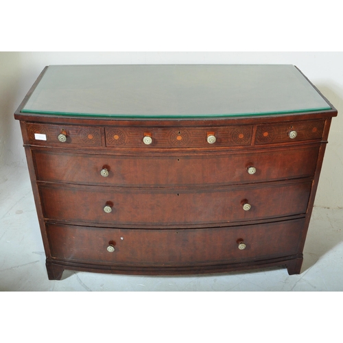 1504 - Early 20th century mahogany stencil decorated bow fronted chest of drawers. The chest with bracket f... 