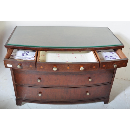 1504 - Early 20th century mahogany stencil decorated bow fronted chest of drawers. The chest with bracket f... 