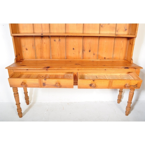 1507 - Victorian 19th century pine Welsh dresser. Raised on turned legs with ring centres having fitted fri... 