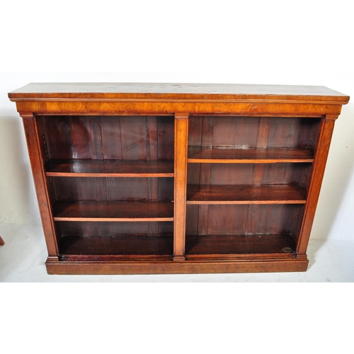 1508 - A Victorian 19th century burr walnut double open bookcase having a flared chamfered top over two she... 