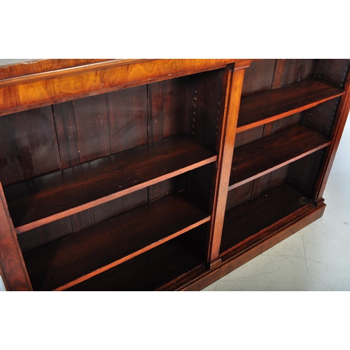 1508 - A Victorian 19th century burr walnut double open bookcase having a flared chamfered top over two she... 