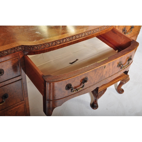 1509 - Queen Anne burr walnut revival dressing table being raised on cabriole legs with pad feet having ped... 