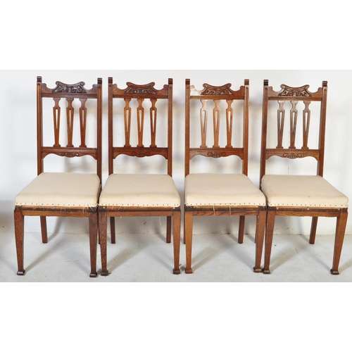 1510 - A set of 4 Victorian 19th century Arts & Crafts oak dining chairs in the manner of Liberty of London... 