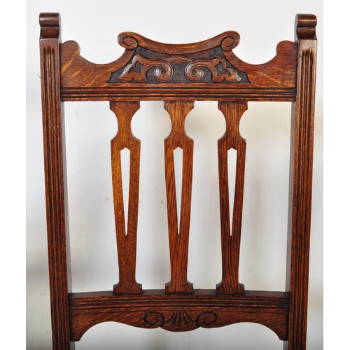 1510 - A set of 4 Victorian 19th century Arts & Crafts oak dining chairs in the manner of Liberty of London... 