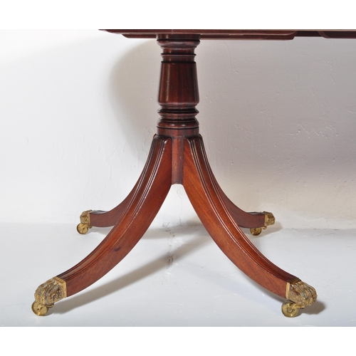 1511 - A George III style 20th century Cuban mahogany pedestal D End dining table having a chamfered top ra... 