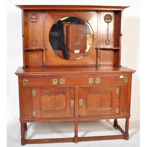 1512 - A 19th century Victorian Arts & Crafts oak sideboard in the manner of Liberty of London. Turned legs... 