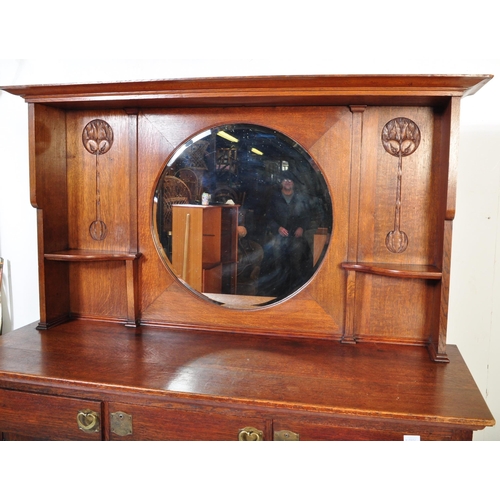 1512 - A 19th century Victorian Arts & Crafts oak sideboard in the manner of Liberty of London. Turned legs... 