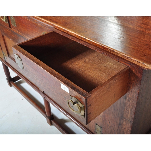 1512 - A 19th century Victorian Arts & Crafts oak sideboard in the manner of Liberty of London. Turned legs... 