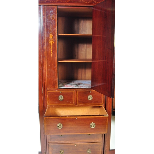 1515 - Edwardian mahogany inlaid triple wardrobe compactum. Raised on plinth base with triple section compr... 