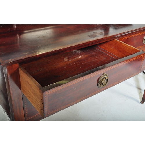 1516 - Edwardian mahogany inlaid dressing table chest. Raised on square tapering legs with short and deep d... 