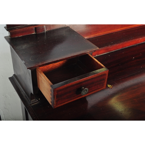 1516 - Edwardian mahogany inlaid dressing table chest. Raised on square tapering legs with short and deep d... 