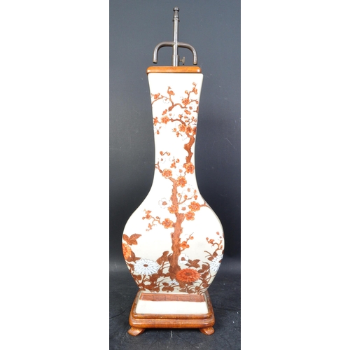 1524 - A vintage 20th century Chinese ceramic table lamp being converted from a Chinese vase having a beige... 