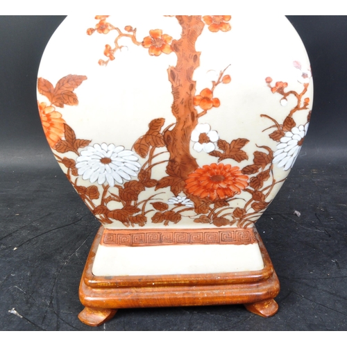 1524 - A vintage 20th century Chinese ceramic table lamp being converted from a Chinese vase having a beige... 