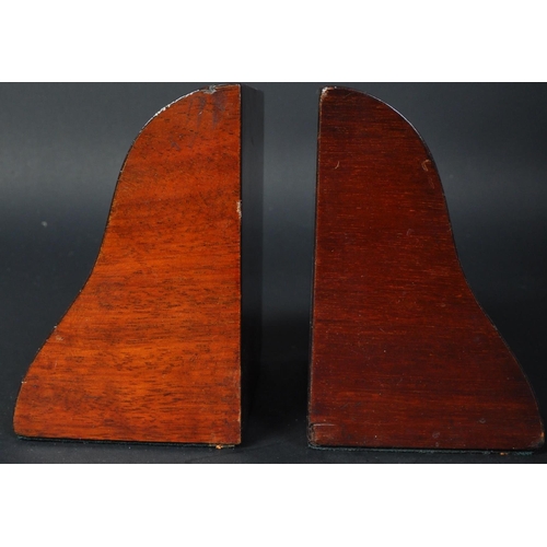 1527 - A pair of Edwardian mahogany inlaid weighed book ends. Each bookend of sloped mahogany veneer form b... 