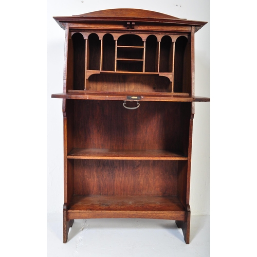 1535 - An early 20th century circa. 1920's Arts and Crafts oak student bureau having a gallery back to top ... 