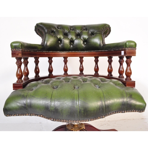 1542 - A 20th century Victorian Revival green leather Chesterfield Captains deep button back yew wood frame... 