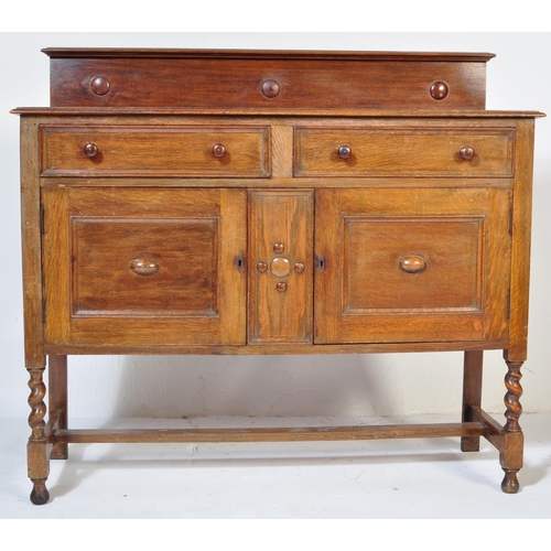 1546 - 1920's Jacobean revival solid oak sideboard / credenza. Raised on barley twist legs united by stretc... 