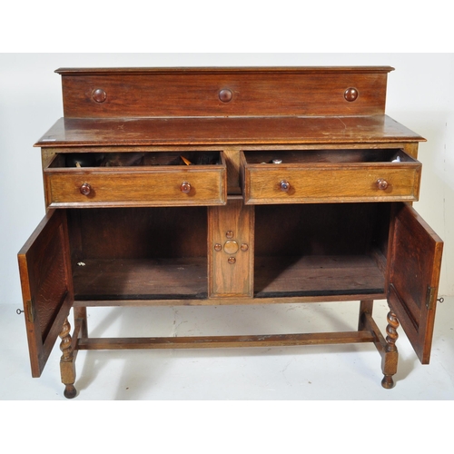 1546 - 1920's Jacobean revival solid oak sideboard / credenza. Raised on barley twist legs united by stretc... 