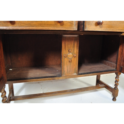 1546 - 1920's Jacobean revival solid oak sideboard / credenza. Raised on barley twist legs united by stretc... 