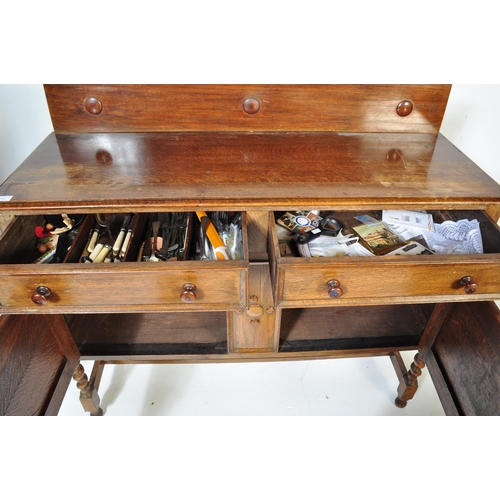 1546 - 1920's Jacobean revival solid oak sideboard / credenza. Raised on barley twist legs united by stretc... 