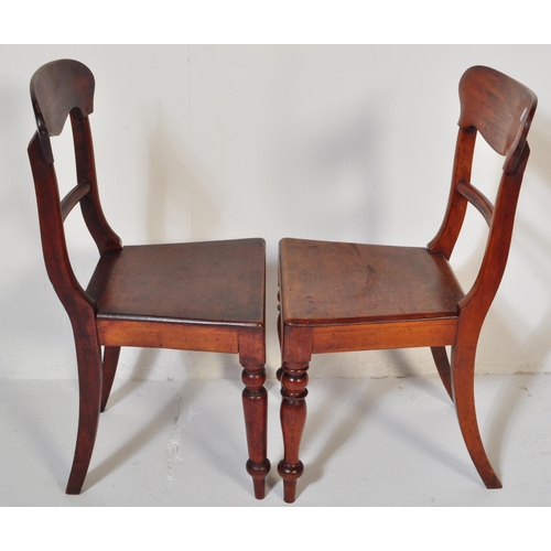 1548 - A pair of 19th century Regency mahogany bar back hall /  dining chairs. Raised on turned legs with p... 