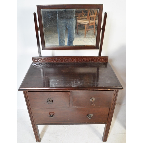 1552 - A 1920's oak Jacobean revival chest of drawers and matching dressing chest table. Each raised on squ... 