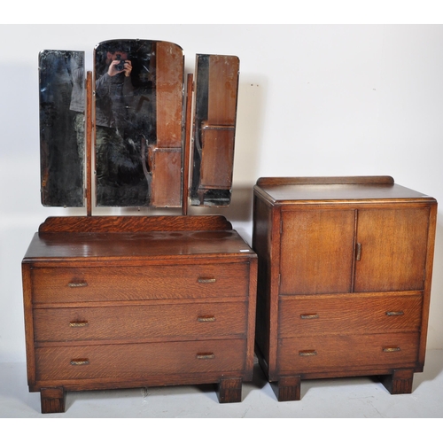 1554 - A 1930's Art Deco oak dressing table - chest being raised on bracket feet  with a low and wide body ... 