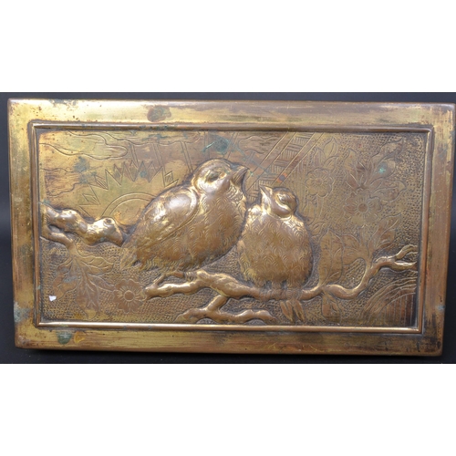 1557 - A 19th century Victorian  repousse worked casket box in brass. The chest with relief worked wrens to... 