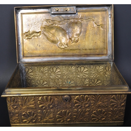 1557 - A 19th century Victorian  repousse worked casket box in brass. The chest with relief worked wrens to... 