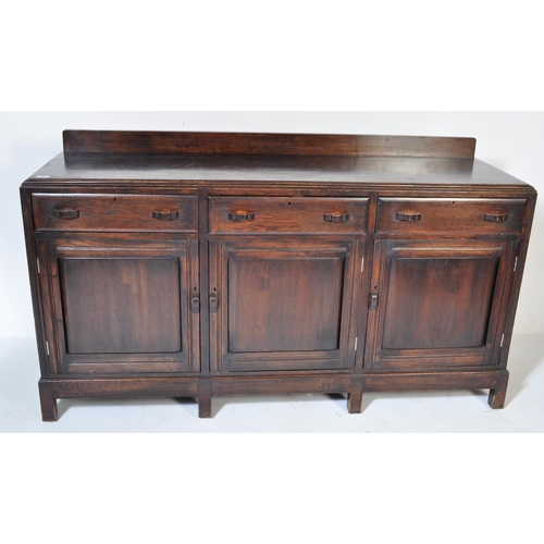 1561 - An early 20th century circa. 1920's mahogany sideboard credenza. The sideboard having a gallery back... 