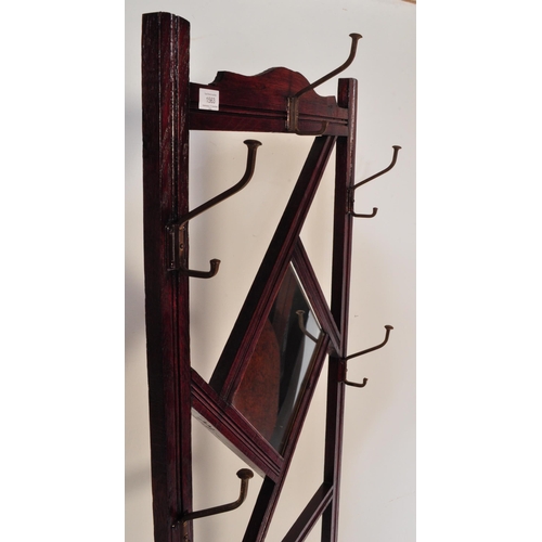 1563 - A Victorian 19th century mahogany hallstand. The Hall stand with reeded decoration to the uprights, ... 