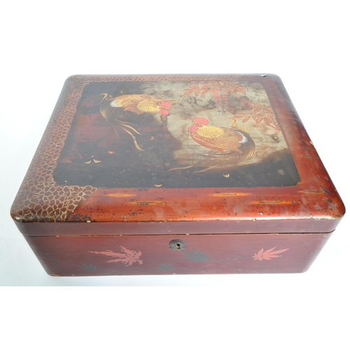 1567 - An early 20th century Chinese chinoiserie table top box. The box having lacquered body and being han... 