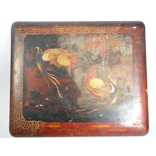 1567 - An early 20th century Chinese chinoiserie table top box. The box having lacquered body and being han... 