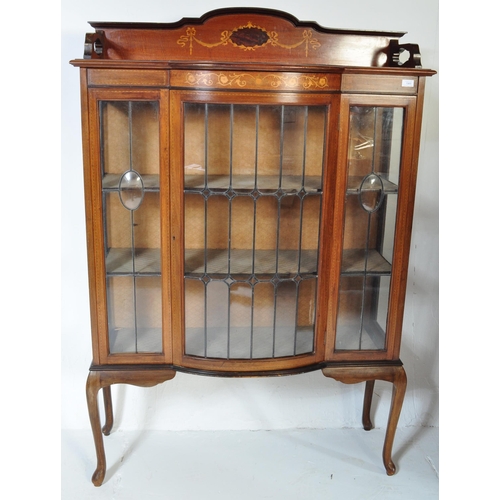 1569 - Edwardian mahogany and leaded glass inlaid bow front China display cabinet vitrine. Raised on cabrio... 