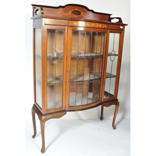 1569 - Edwardian mahogany and leaded glass inlaid bow front China display cabinet vitrine. Raised on cabrio... 