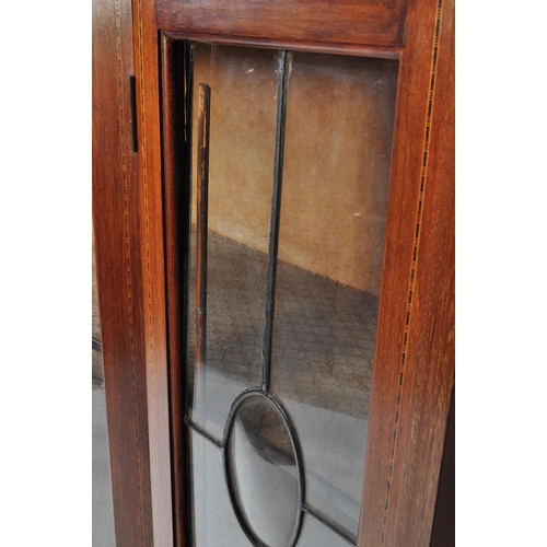 1569 - Edwardian mahogany and leaded glass inlaid bow front China display cabinet vitrine. Raised on cabrio... 