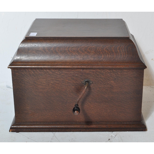 1571 - A 1920's early 20th century oak cased table top gramophone by HMV - His Masters Voice. Hinged top wi... 