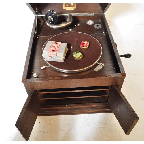 1571 - A 1920's early 20th century oak cased table top gramophone by HMV - His Masters Voice. Hinged top wi... 