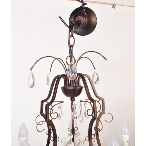 1574 - 20th century cut glass and wrought metal classical 5 arm chandelier. The shaped wrought metal frame ... 