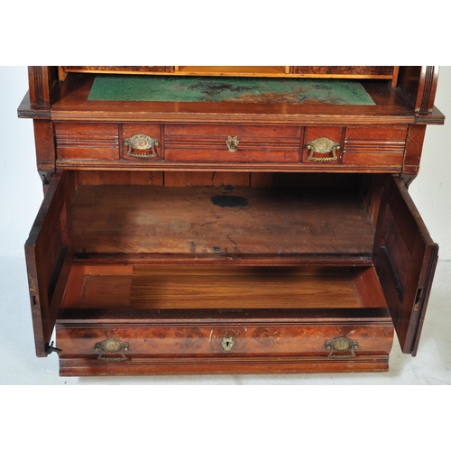 1579 - A late 19th Century Aesthetic movement mahogany cylinder bureau bookcase. Having a flared top with r... 