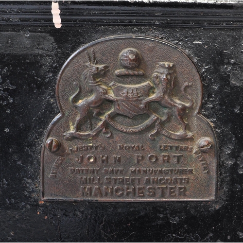 1584 - A Victorian late 19th century John Port of Manchester black cast iron safe with key. The safe having... 