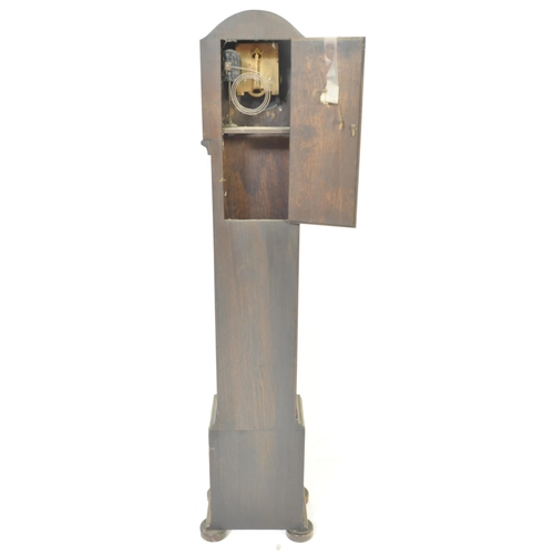 1594 - An early 20th century circa. 1920's / 1930's grandmother clock. The clock having a silvered face wit... 