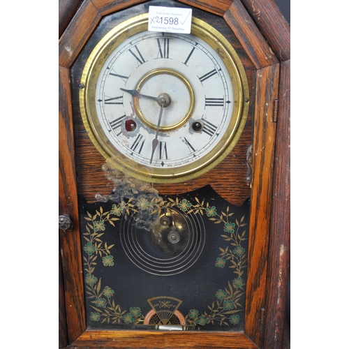 1598 - An early 20th century inlaid marquetry wall hanging clock. The clock having central gilt metal gadro... 