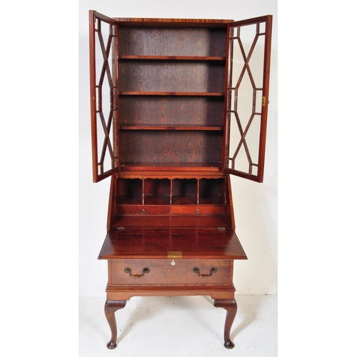 1608 - A 1930's Queen Anne revival walnut and burr walnut bureau bookcase. Of rectangular form with twin gl... 