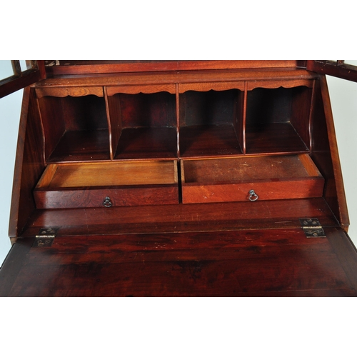 1608 - A 1930's Queen Anne revival walnut and burr walnut bureau bookcase. Of rectangular form with twin gl... 