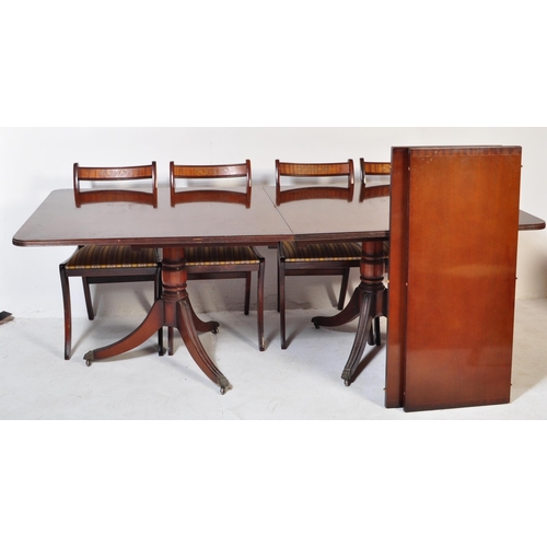 1616 - A large Regency revival mahogany and brass inlaid dining room suite. The suite comprising pedestal d... 