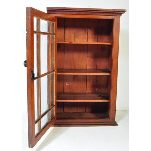 1627 - A Victorian 19th century pitch pine glazed fronted bookshelf cabinet. The cabinet having a 12 panel ... 