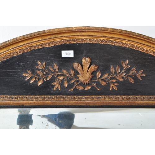 1633 - A Victorian 19th century ebonised & gilt wooden overmantel mirror. The mirror having an arched top w... 