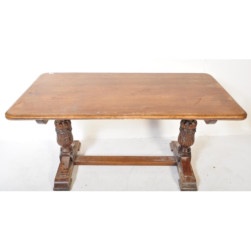 1637 - A Jacobean revival carved oak refectory dining table. The table raised on heavily carved baluster le... 